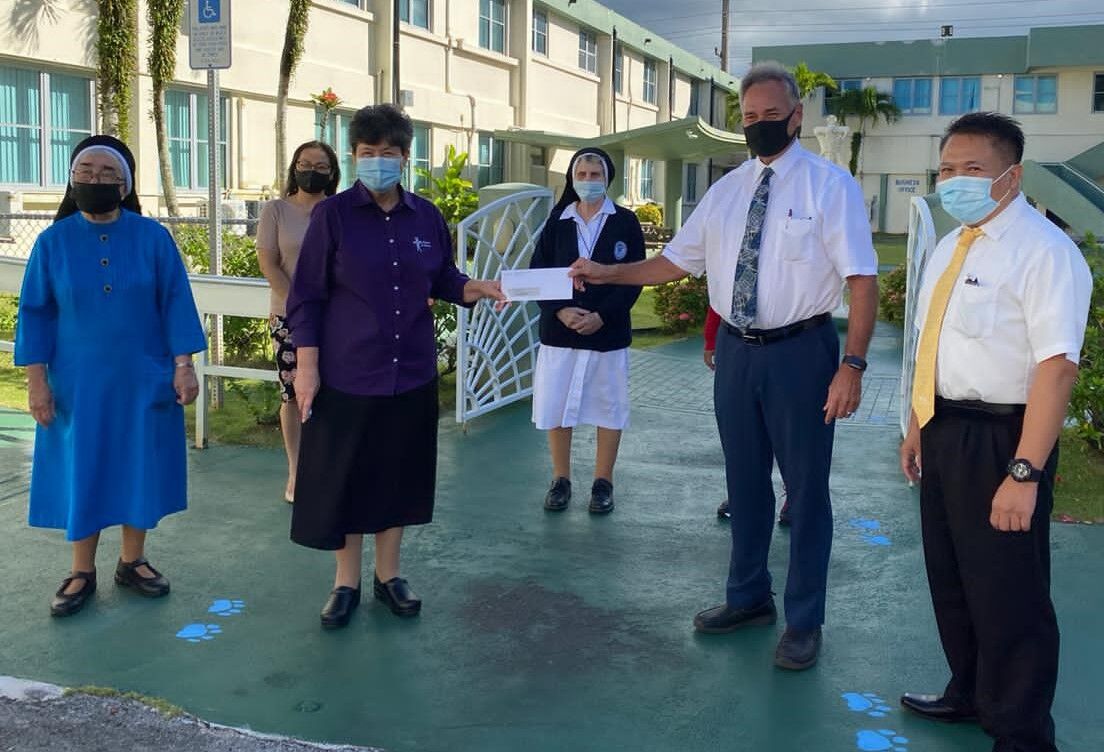 The Church of Jesus Christ of Latter-day Saints presents $5K check to AOLG Walking Nuns